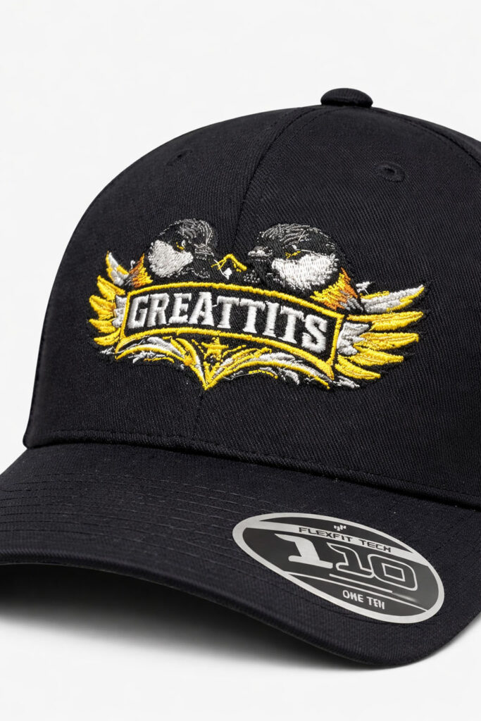 Humoristisk och unik keps med två "Great tits". Alltså talgoxar. Tänk inget annat!