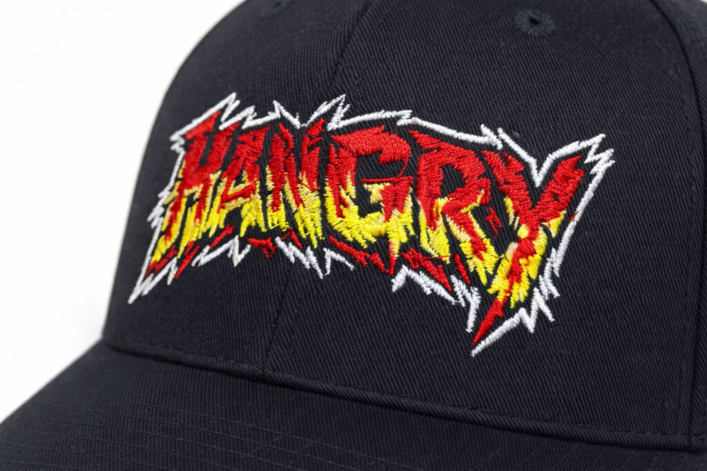 Unik keps med broderade texten "Hangry". För dig som lätt tappar humöret när blodsockret sjunker.